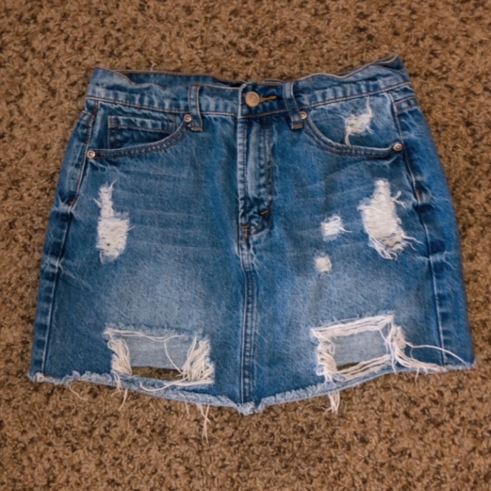 Distressed jean mini skirt